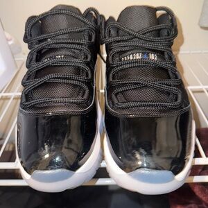 Jordan 11 low Black and White Athletic Shoes